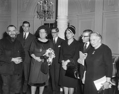 Abbé Pierre, Queen Juliana, Professor C.W. Monnich, Mrs. Leiker, Walter Petersilka, and G. Kurz at the award ceremony for the Albert Schweitzer Prize at the Concertgebouw Amsterdam on January 23, 1965