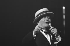 Maurice Chevalier farewell performance at Concertgebouw in Amsterdam wearing straw hat black and white photo