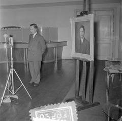 Black and white photograph showing the presentation of a portrait of Evert Cornelis to the Concertgebouw in Amsterdam, dated January 22, 1954