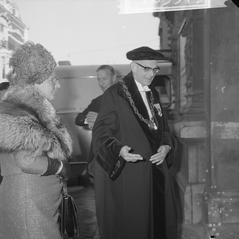 Queen Juliana arriving at the Concertgebouw in Amsterdam with rector magnificus professor De Gaay Fortman on her right in 1965