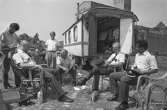 Police officers negotiating with residents during the halted eviction of a trailer park at Stenen Hoofd in Amsterdam in 1989