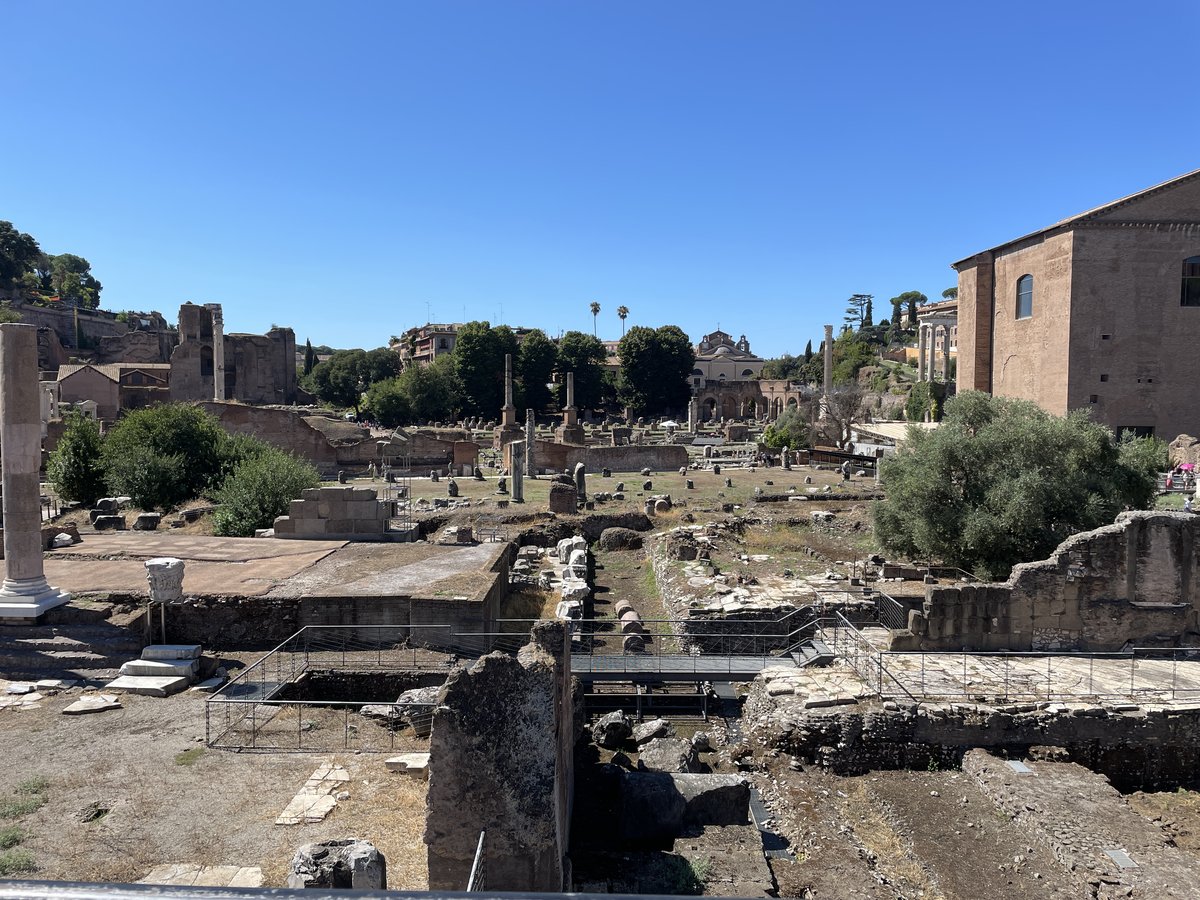 Northern end of the Roman Forum with the intact Curia Iulia building on the right