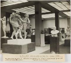 Interior view of a sculpture room at the 1944 Salon exhibition in the Musée d'Art Moderne in Paris showcasing the 'Ronde de jeunes filles' sculpture group by Raymond Delamarre