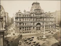 Post Office Square in Boston with seating and greenery under a bright sky
