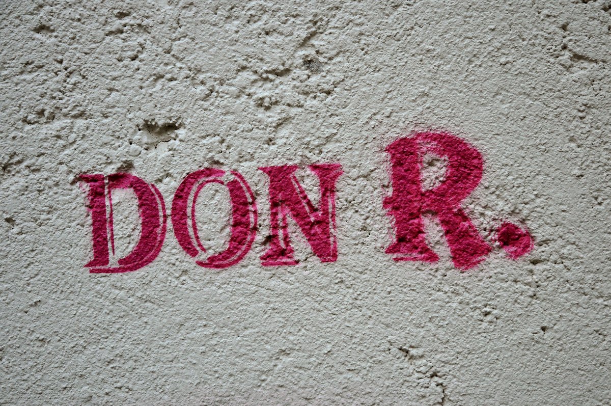 Stencil graffiti artwork on a wall at Kapuzinertheater