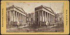 Historic black and white image of U.S. Treasury and Wall Street buildings