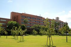 Osaka Gakuin University yard with modern buildings and greenery in Osaka, Japan