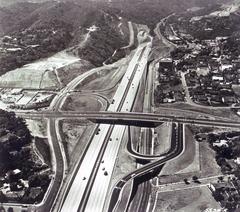 San Diego Freeway at Sunset Boulevard overcrossing northbound two-quad modified cloverleaf interchange