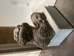 Winged lion statue guarding tombs at Musée Guimet