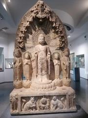 Ancient bifacial Buddhist votive stele from Northern Qi dynasty, white marble with traces of polychromy, Hebei, China