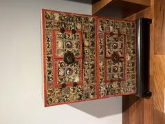 Polychrome painted decorated chests displayed at Musée Guimet