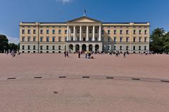 Royal Palace in Oslo with clear sky and greenery