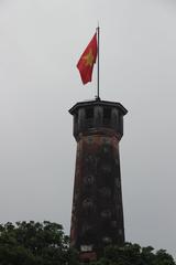 Hanoi Flag Tower at Army Museum in Hanoi with green trees and clear blue sky