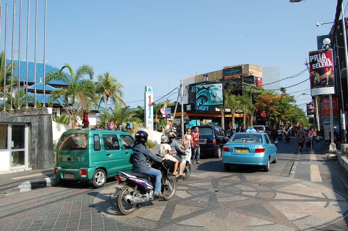 Ground zero of the 2002 Bali bombings with damaged buildings and debris