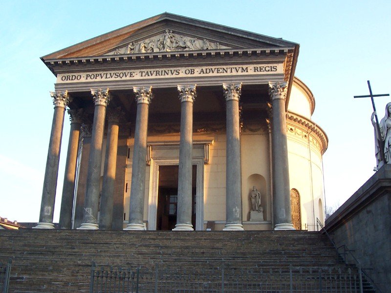Front view of Chiesa della Gran Madre di Dio in Torino with classical columns and statues