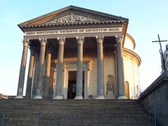 Front view of Chiesa della Gran Madre di Dio in Torino with classical columns and statues