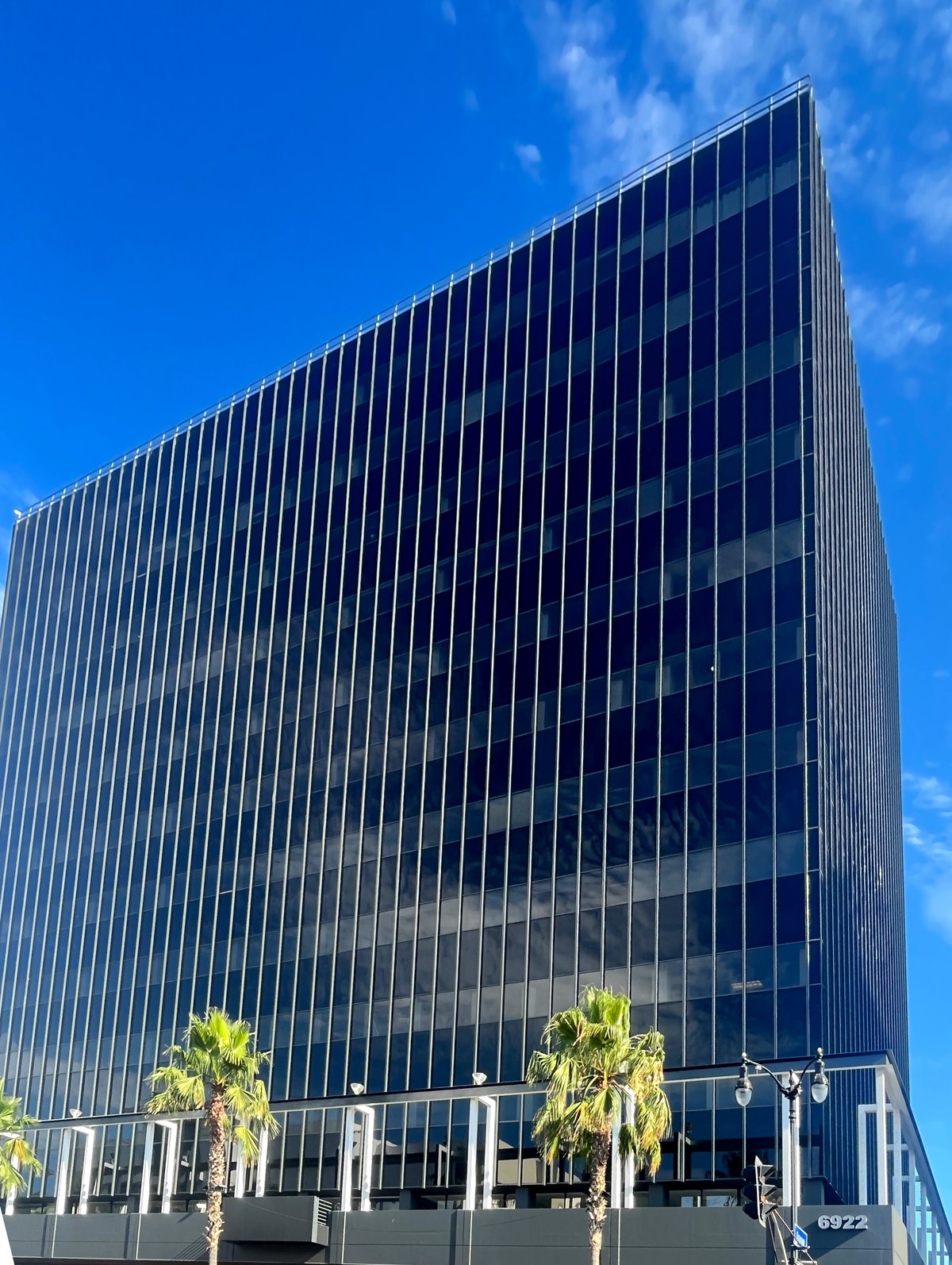 Exterior view of 6922 Hollywood Blvd Building with clear sky in July 2023