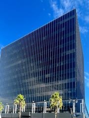 Exterior view of 6922 Hollywood Blvd Building with clear sky in July 2023