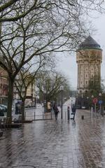 Old distinctive water tower near Metz train station used historically for steam locomotives and railway workers' baths now abandoned