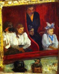Person sitting in a theater loge