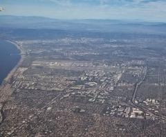 Aerial view of Los Angeles International Airport (LAX) showing runways, terminals, and surrounding area