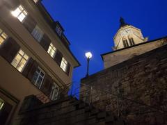 View of the old Aula and Collegiate Church with street lamp in Tübingen