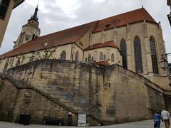 Stiftskirche St. Georg Tübingen over rooftops and Neckar River