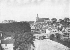 View of Tübingen from the southeast around 1875 showing Eberhardsbrücke, Neckartor with Kunstmühle Louis Schnaith, Café Müller, Neckarfront with Stiftskirche, and Schloss Hohentübingen