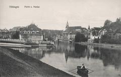 View of Neckar River with Steinlach River mouth, newly built Officers' Casino, Eberhardsbrücke bridge, Neckarfront of old town including Stiftskirche and Schwabenhaus in Tübingen
