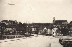 View from the Blue Bridge into Friedrichstraße in Tübingen with Steinlach Bridge, Stiftskirche, and Hohentübingen Castle