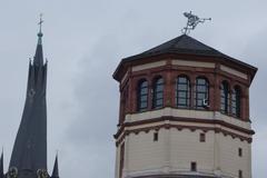 View of Schlossturm and St. Lambertus in Düsseldorf with bent weather vane after June 2014 storm