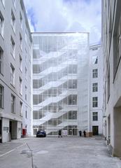 Interior stairwell of the Austrian Postsparkasse building courtyard facing east