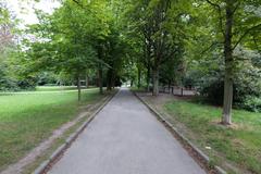 Scenic view of Grüneburgpark with green lawns, trees, and walking paths in Frankfurt am Main