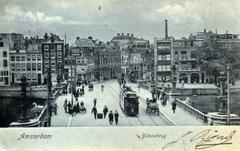 Vintage postcard of Amsterdam featuring the Blauwbrug bridge and Motorwagen 59 on tram line 9 in 1905