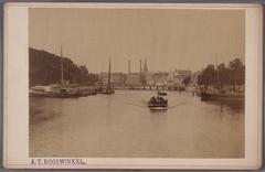 View of the Amstel River looking north towards the Blauwbrug bridge under construction with a wooden temporary bridge in front, Amsterdam 1883