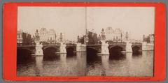 Historic view of Amstel Bridge (Blauwbrug) in Amsterdam towards Waterlooplein with R.K. Mozes and Aaron Church in 1883