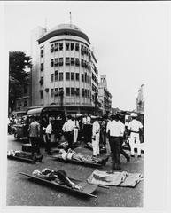 Casualties awaiting evacuation from bombing outside U.S. Embassy in Saigon on 30 March 1965