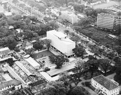 US Embassy Saigon building in 1967 with American and South Vietnamese flags