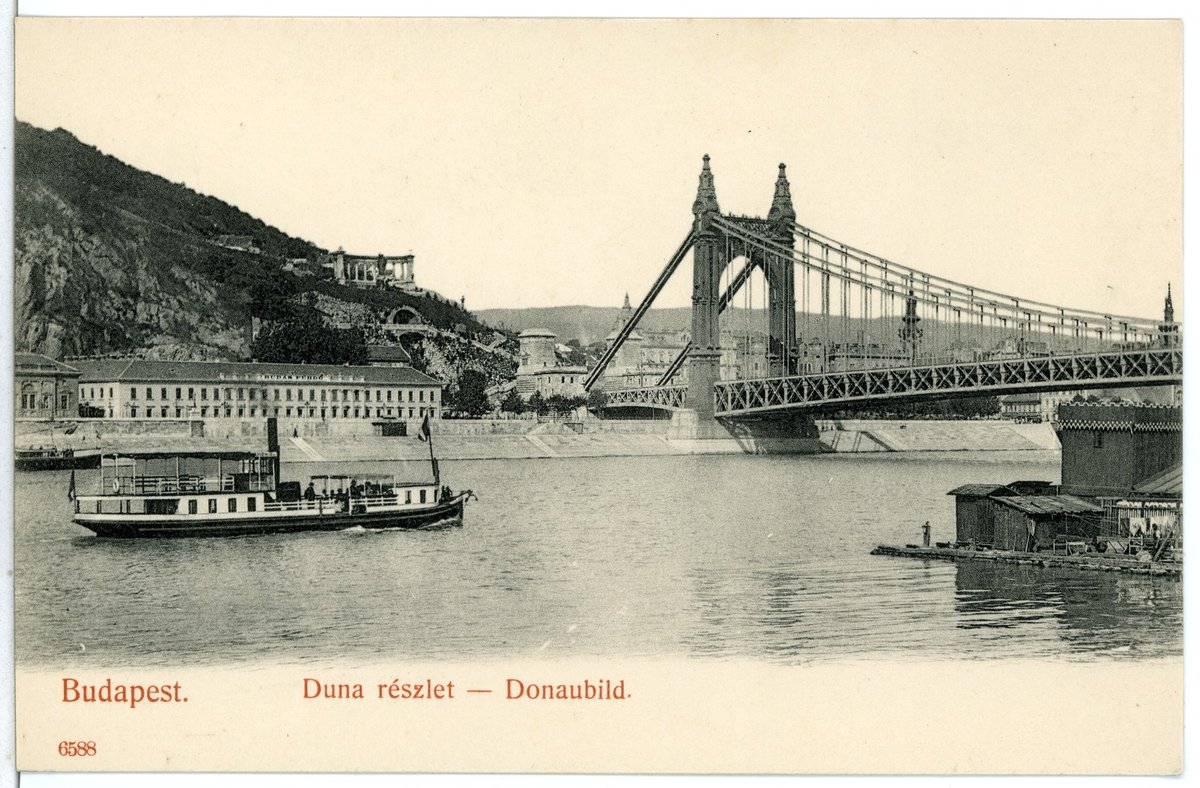 Historic image of Donaubrücke bridge with steamship in Budapest, 1905