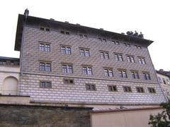 Palais Schwarzenberg in Prague with classical architecture and clear blue sky