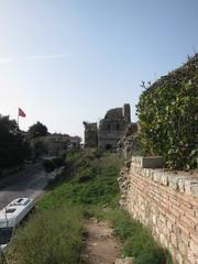 A panoramic view of Istanbul city with mosques and traditional buildings under a partly cloudy sky