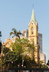 Iglesia Nuestra Señora de los Hombres Negros church exterior with red tiled roof and beige walls