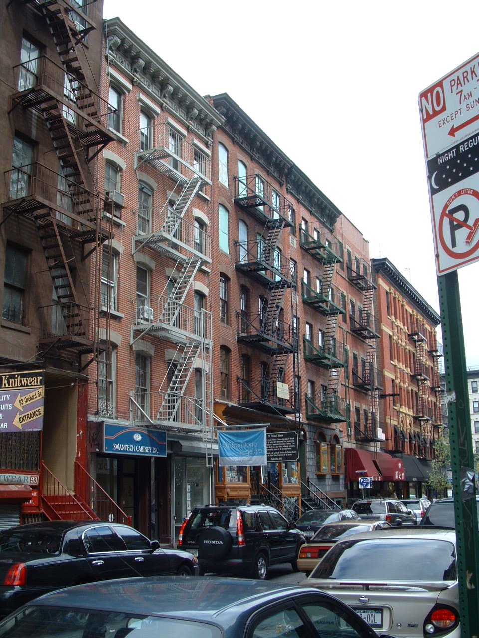 View of Orchard Street on the Lower East Side of Manhattan, New York City, showing historic buildings and street scene