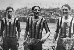 Juventus footballers Raimundo Orsi, Giovanni Vecchina and Federico Munerati leaving pitch after victory against Bologna, May 1, 1932