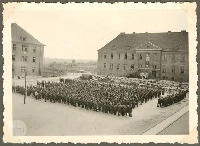 Field Mass at Oflag Itzehoe with prisoners attending outdoors