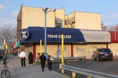 Touro Nursing Program building on 54th Street during a sunny late afternoon