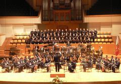10th anniversary celebration of the Banda de Musica Campanar with musicians performing on stage