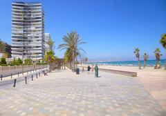 San Juan beach in Alicante with clear blue sea and sandy shore