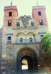 Puerta del Cambron gate in Toledo, historic stone architecture with fortified walls and clear sky