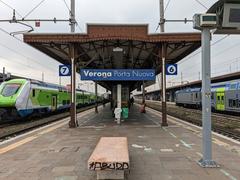 Train platforms 6 and 7 at Verona Porta Nuova railway station under bright sky